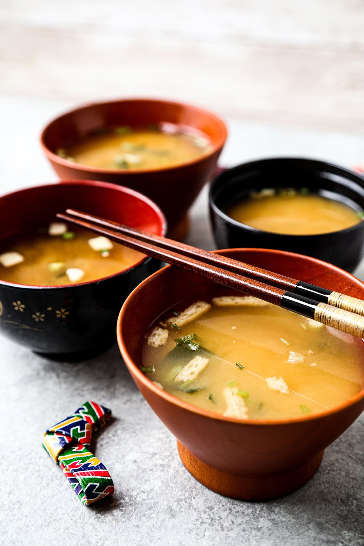 Bowl of miso soup with tofu and green onion