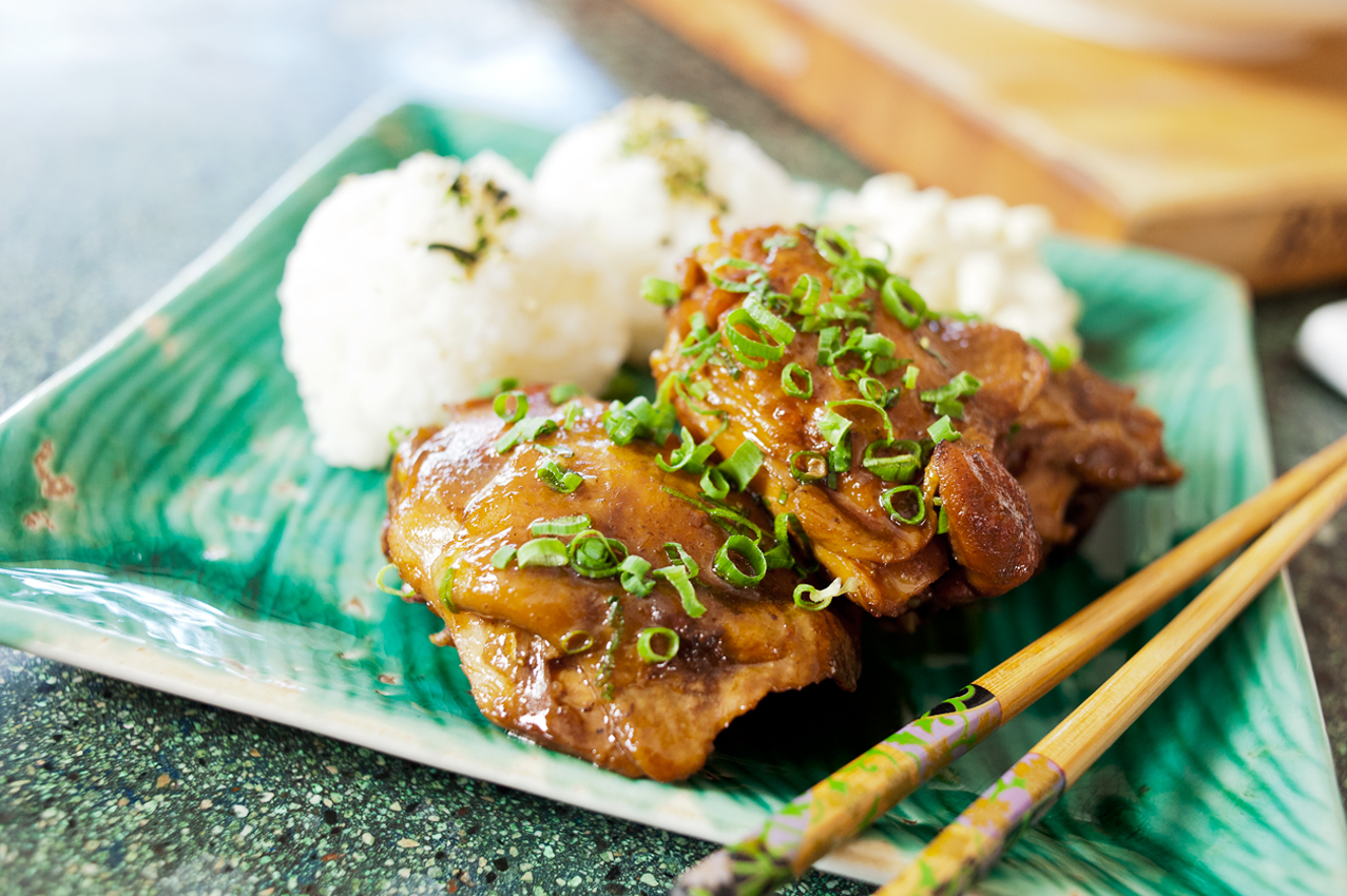 Shoyu chicken served over rice